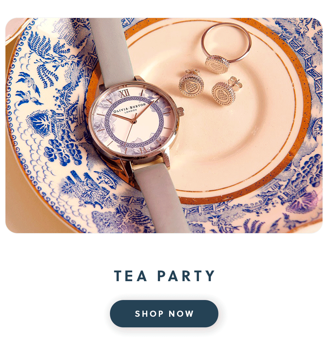 An Olivia Burton watch and jewellery on a china plate with text tea part shop now
