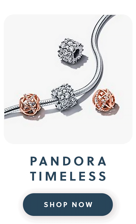 A close up of a Pandora bracelet with four charms with text timeless shop now